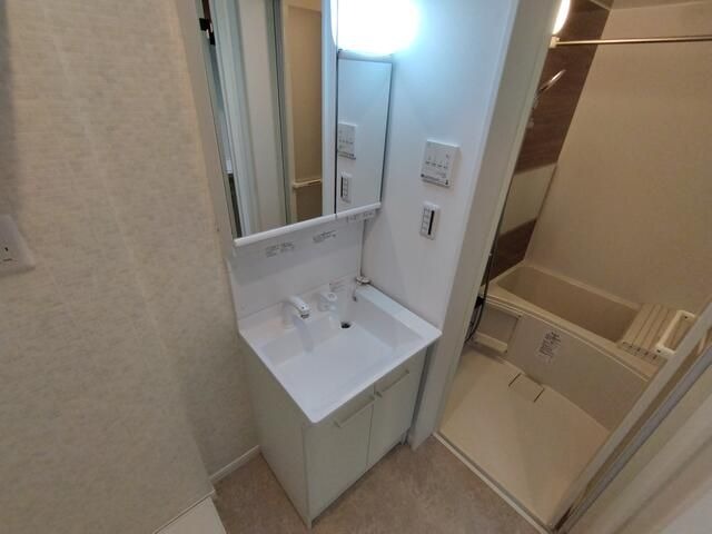 ��ʌ��������܎s�k��听���S���ڂ̃A�p�[�g�̐��ʏ�