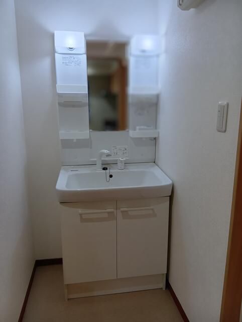 ��ʌ������s���Q���ڂ̃}���V�����̐��ʏ�