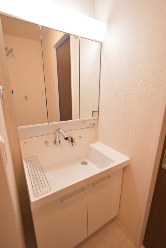 ��ʌ��������܎s�Y�a��{���T���ڂ̃A�p�[�g�̐��ʏ�