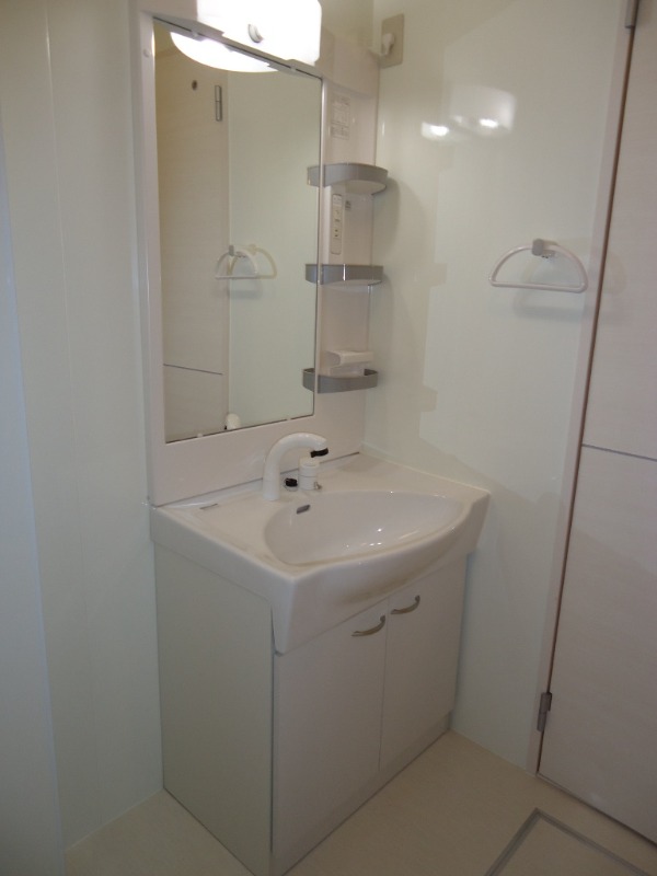 ��ʌ�����s�厚�����̃A�p�[�g�̐��ʏ�