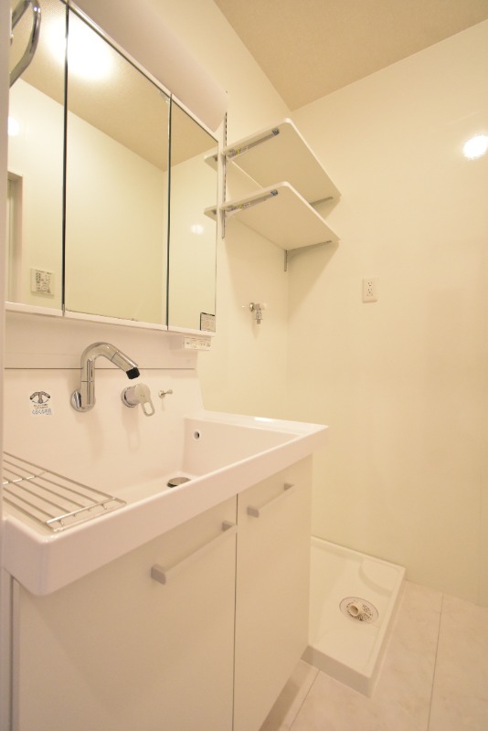 ��ʌ��������܎s�k��������Q���ڂ̃A�p�[�g�̐��ʏ�