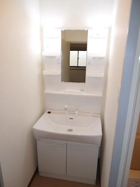 ��ʌ�����s�k����P���ڂ̃}���V�����̐��ʏ�