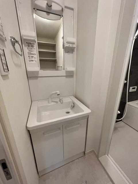 ��ʌ��������܎s��{��g�~���Q���ڂ̃A�p�[�g�̐��ʏ�