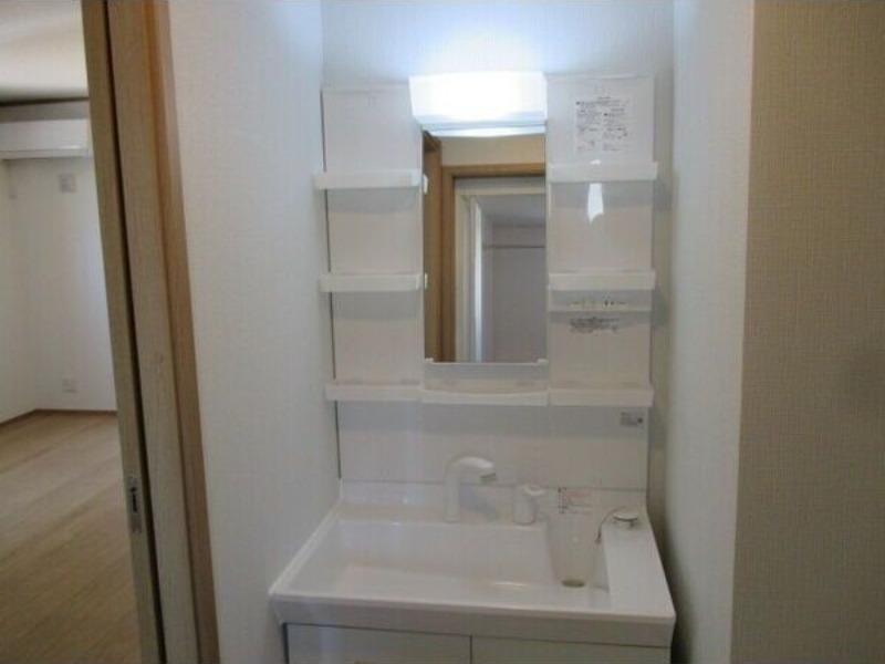 ��ʌ��������܎s�΋�厚�O���̃A�p�[�g�̐��ʏ�