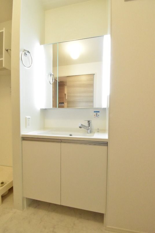 ��ʌ��������܎s�k��{�����R���ڂ̃A�p�[�g�̐��ʏ�