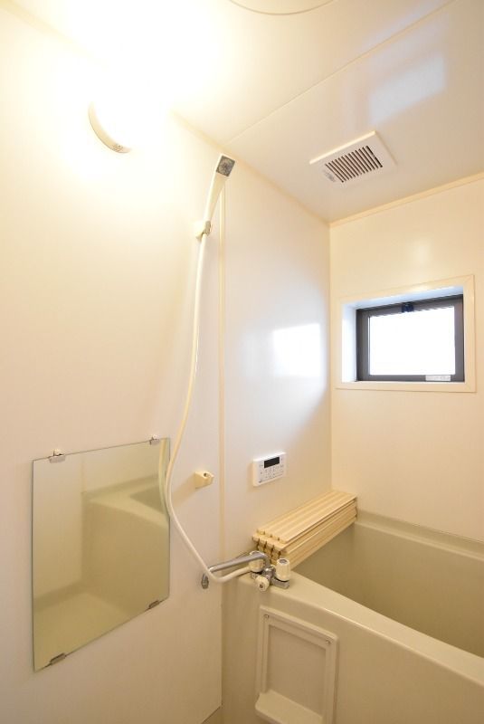 ��ʌ�����s������U���ڂ̃A�p�[�g�̃o�X