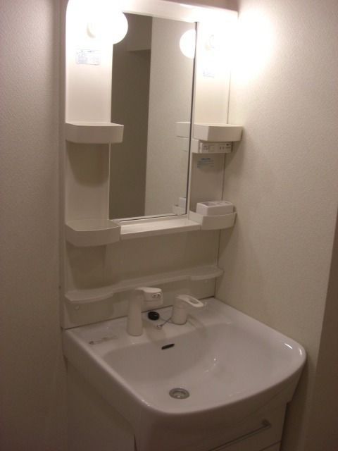 ��ʌ��������܎s�Y�a���؍�P���ڂ̃}���V�����̐��ʏ�