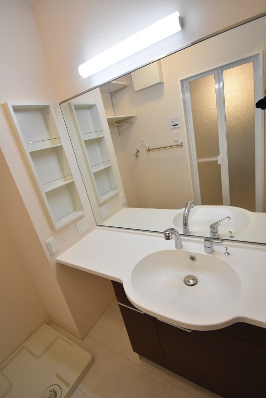 ��ʌ��������܎s�k����i���Q���ڂ̃A�p�[�g�̐��ʏ�