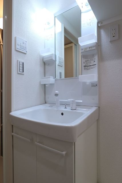 ��ʌ��������܎s��{����ؒ��S���ڂ̃A�p�[�g�̐��ʏ�