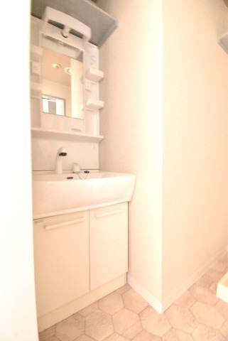 ��ʌ�����s�厚�ؑ]�C�̃}���V�����̐��ʏ�