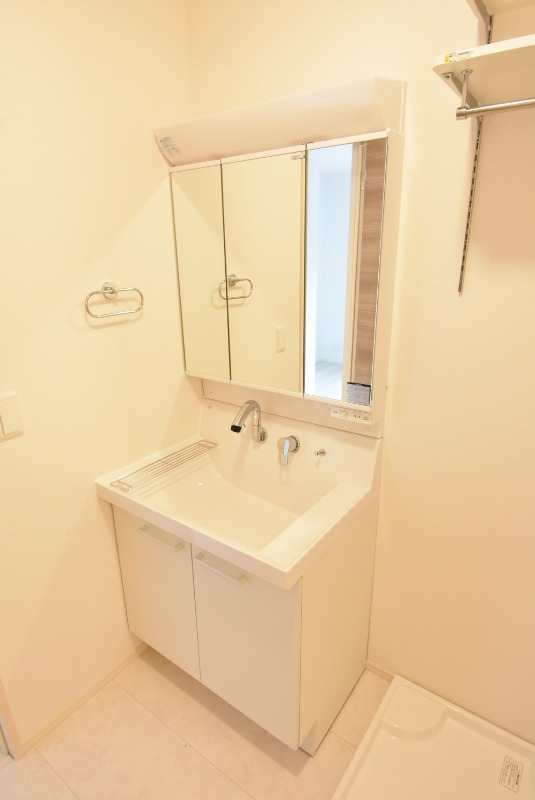 ��ʌ��������܎s�k����i���Q���ڂ̃A�p�[�g�̐��ʏ�