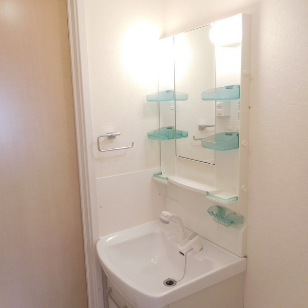 ��ʌ��������܎s��{��㏬���̃A�p�[�g�̐��ʏ�