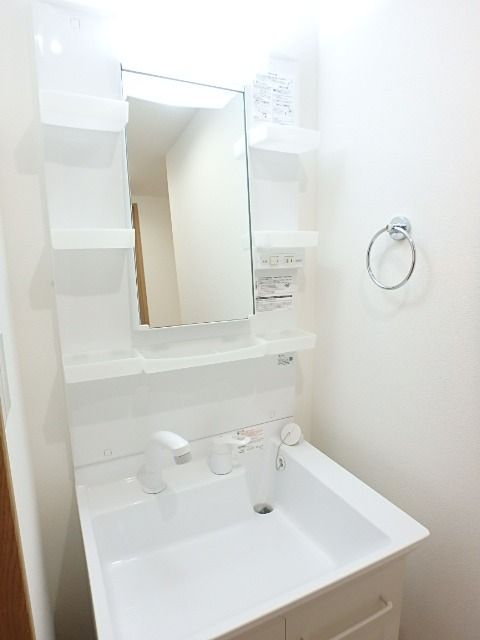 ��ʌ��������܎s��{��O���Q���ڂ̃}���V�����̐��ʏ�