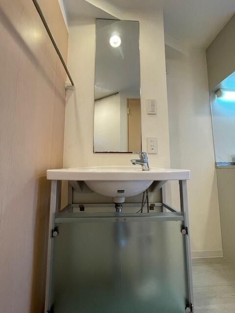 ��ʌ��������܎s��{����ؒ��S���ڂ̃}���V�����̐��ʏ�