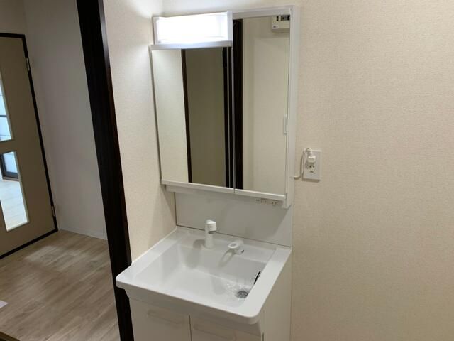 ��ʌ��������܎s�΋�厚�����̃A�p�[�g�̐��ʏ�