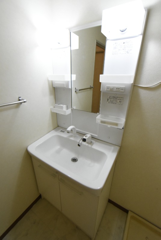 ��ʌ��@�c�s���P���ڂ̃}���V�����̐��ʏ�