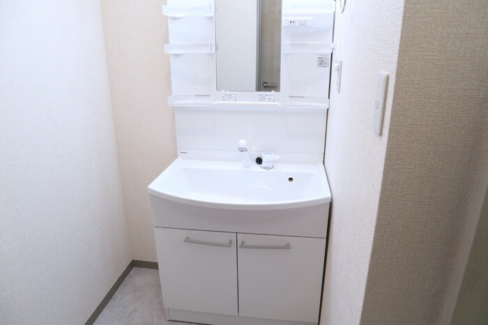 ��ʌ�����s����Q���ڂ̃A�p�[�g�̐��ʏ�