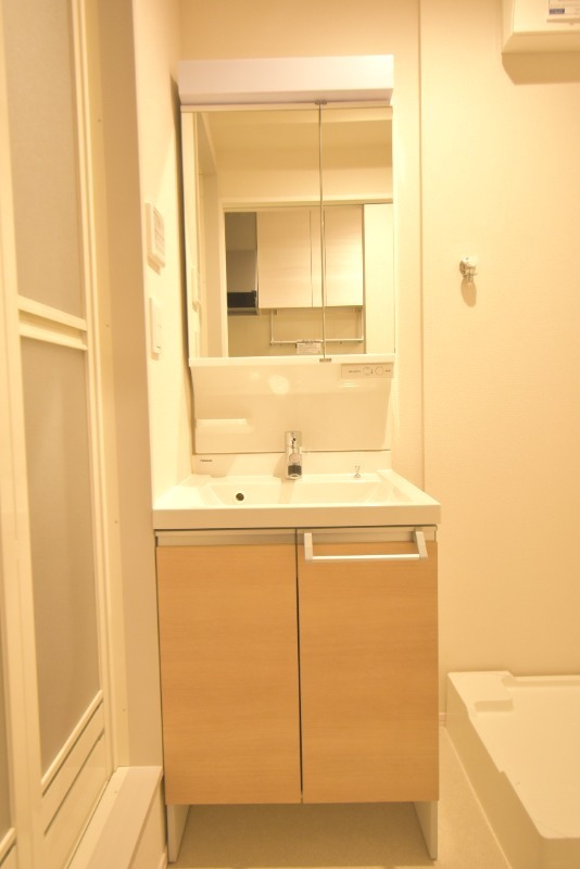 ��ʌ��������܎s��{����ؒ��S���ڂ̃}���V�����̐��ʏ�