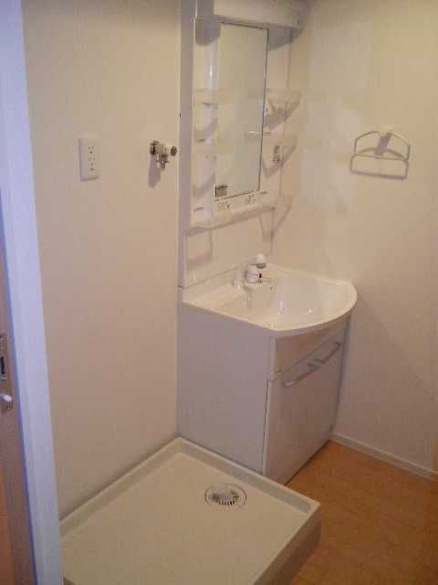 ��ʌ��������܎s�Y�a�擌�������̃}���V�����̐��ʏ�