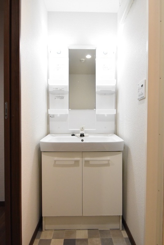 ��ʌ�����s�O�c�a�P���ڂ̃}���V�����̐��ʏ�