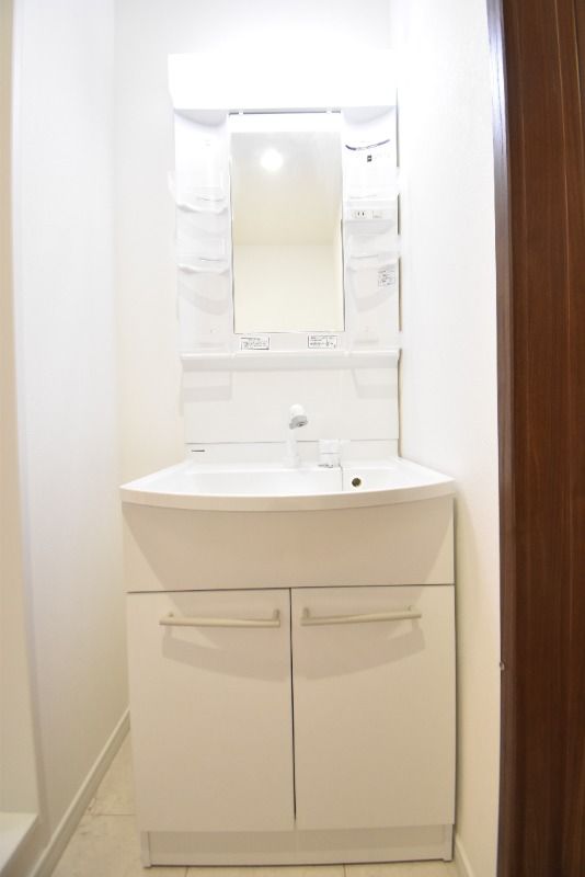 ��ʌ������s����P���ڂ̃A�p�[�g�̐��ʏ�