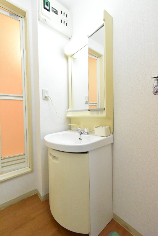 ��ʌ���z�s�厚�I��̃A�p�[�g�̐��ʏ�