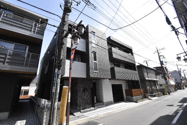 ��ʌ��������܎s��{����ؒ��S����290�̃}���V�����̌����O��