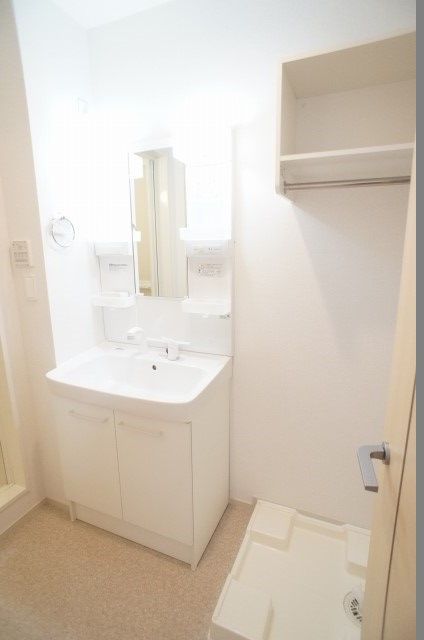 ��ʌ��������܎s�k����i���Q���ڂ̃A�p�[�g�̐��ʏ�