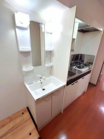 ��ʌ��������܎s�k��y�C���P���ڂ̃}���V�����̐��ʏ�