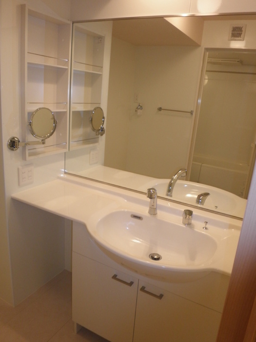 ��ʌ��������܎s�k����i���Q���ڂ̃A�p�[�g�̐��ʏ�