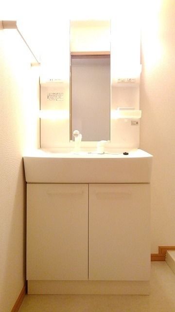 ��ʌ��@�c�s�������̃A�p�[�g�̐��ʏ�