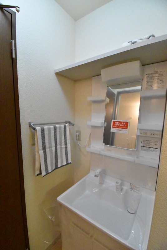 ��ʌ��������܎s�k��{�����S���ڂ̃A�p�[�g�̐��ʏ�