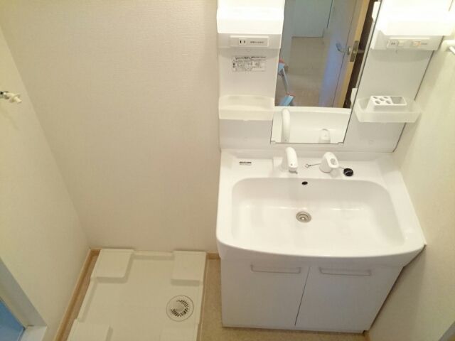 ��ʌ�����s�厚���s�g���̃A�p�[�g�̐��ʏ�