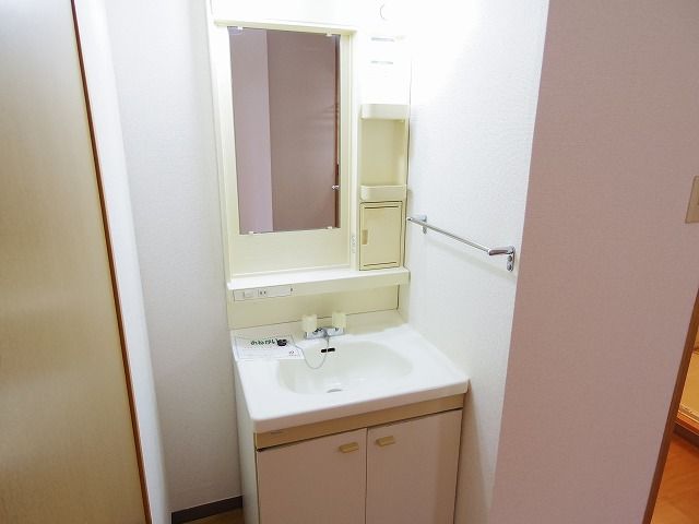 ��ʌ�����s�����R���ڂ̃}���V�����̐��ʏ�