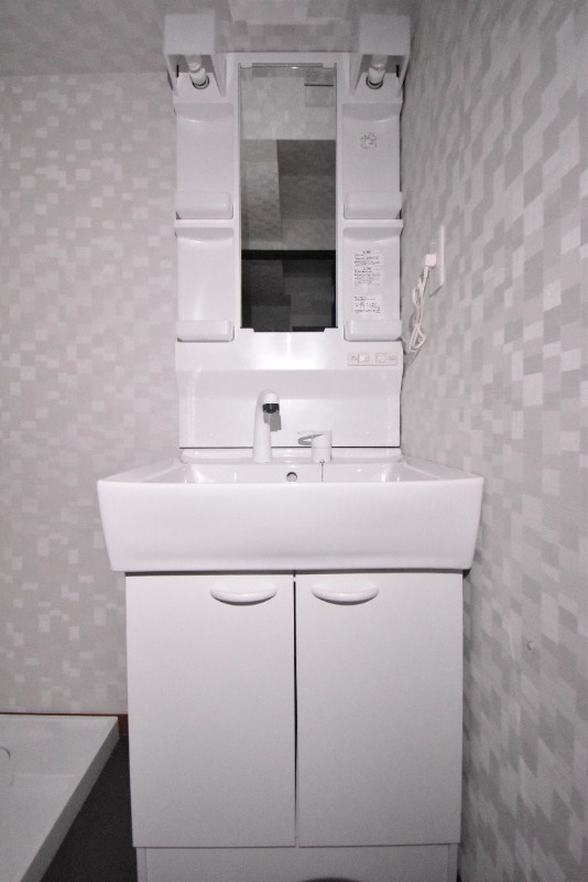 ��ʌ��������܎s�Y�a���؍�R���ڂ̃A�p�[�g�̐��ʏ�