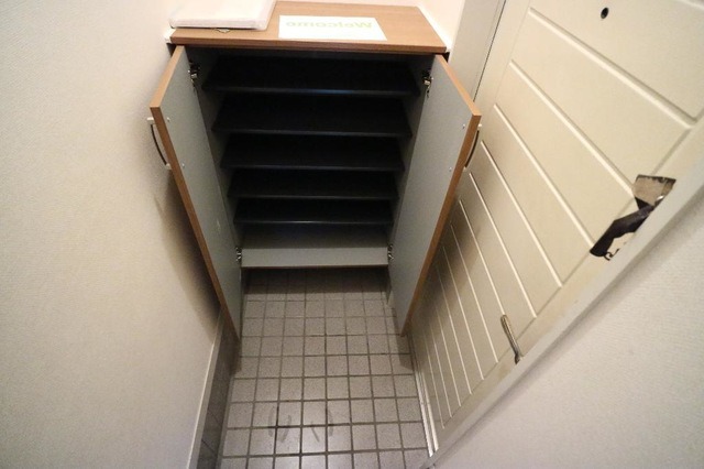 ��ʌ������s���h�R���ڂ̃A�p�[�g�̌���