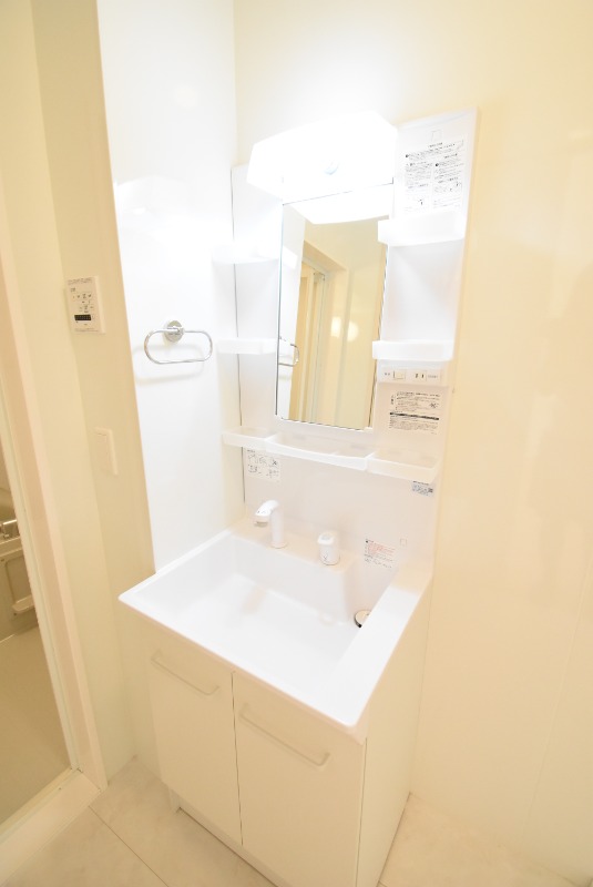 ��ʌ��������܎s����{�O���̃A�p�[�g�̐��ʏ�