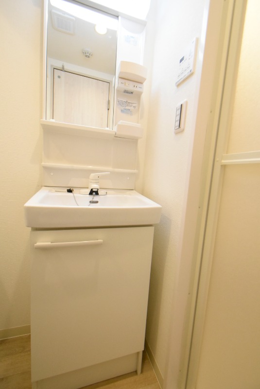 ��ʌ��������܎s�΋擌�Y�a�V���ڂ̃}���V�����̐��ʏ�