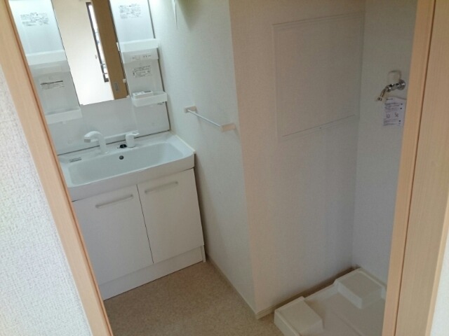 ��ʌ�����s�厚�_�˂̃A�p�[�g�̐��ʏ�