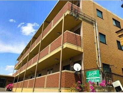 ��ʌ������s�c�˒��̃}���V�����̌����O��