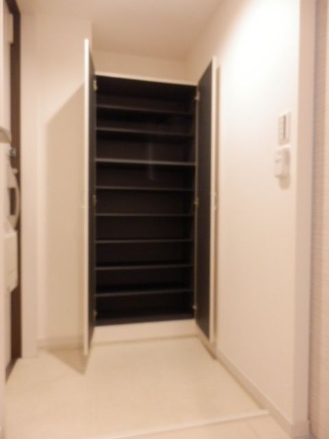 ��ʌ�����s��c�{�̃A�p�[�g�̌���