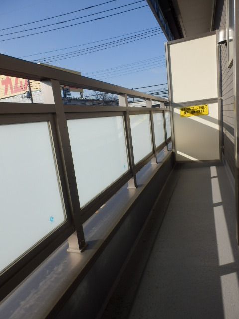 ��ʌ�����s��c�{�̃A�p�[�g�̃o���R�j�[