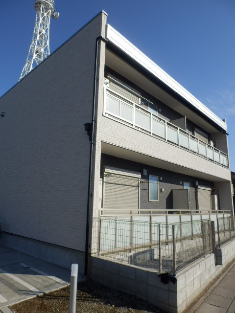 ��ʌ�����s��c�{�̃A�p�[�g�̌����O��