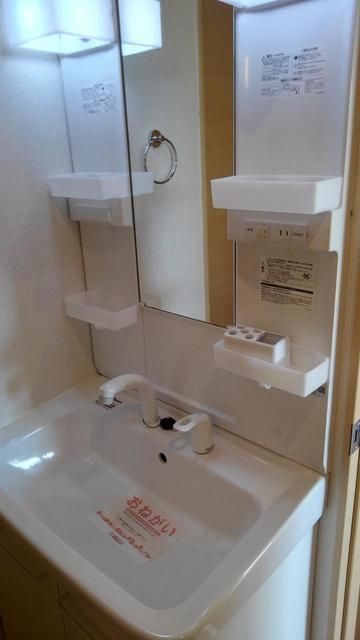 ��ʌ��������܎s����厚��c�{�̃A�p�[�g�̐��ʏ�