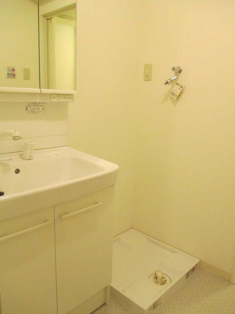 ��ʌ��������܎s��{����ؒ��P���ڂ̃}���V�����̐��ʏ�