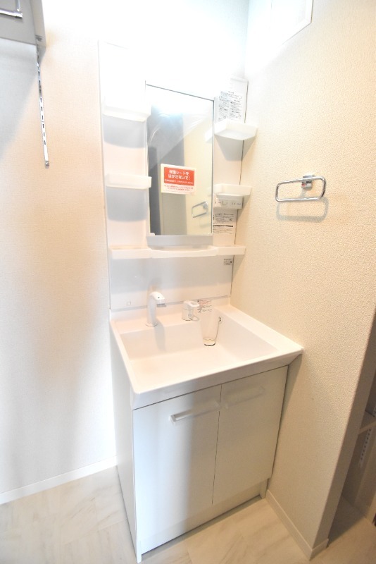 ��ʌ��������܎s�Y�a��j���J�R���ڂ̃}���V�����̐��ʏ�