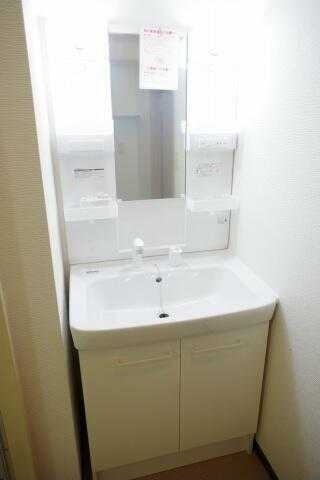 ��ʌ�����s�˒˂R���ڂ̃}���V�����̐��ʏ�