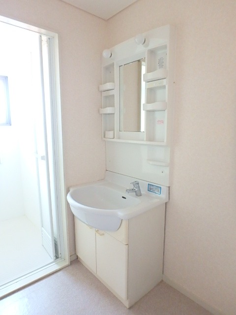 ��ʌ��������܎s��{��㏬���̃}���V�����̐��ʏ�