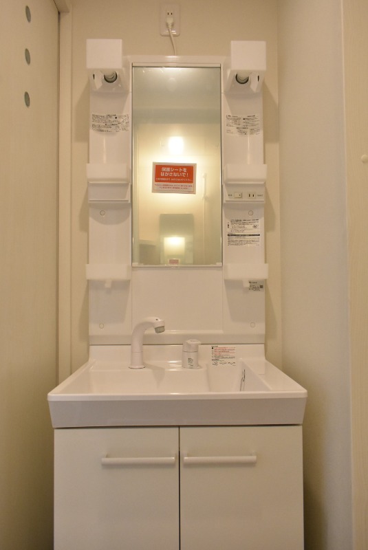 ��ʌ��������܎s�΋�厚�ԋ{�̃A�p�[�g�̐��ʏ�