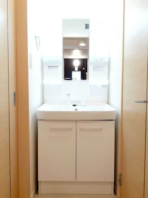 ��ʌ��@�c�s���V�h�U���ڂ̃A�p�[�g�̐��ʏ�